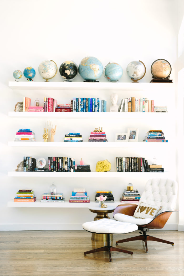 Inspiration Tips How to Style a Bookcase modern floating shelve bookcase vintage globe collection