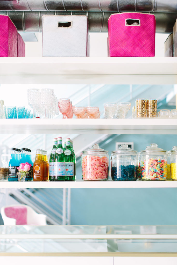 Inspiration tips on how to style a bookcase  or bookshelves using vintage glass collection candy bar 