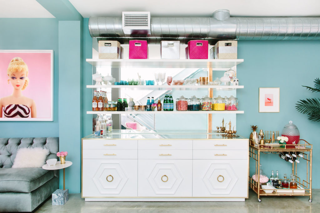 inspiration and tips how to decorate like a design pro, oversized art, gold bar cart, society social cart, barbie art