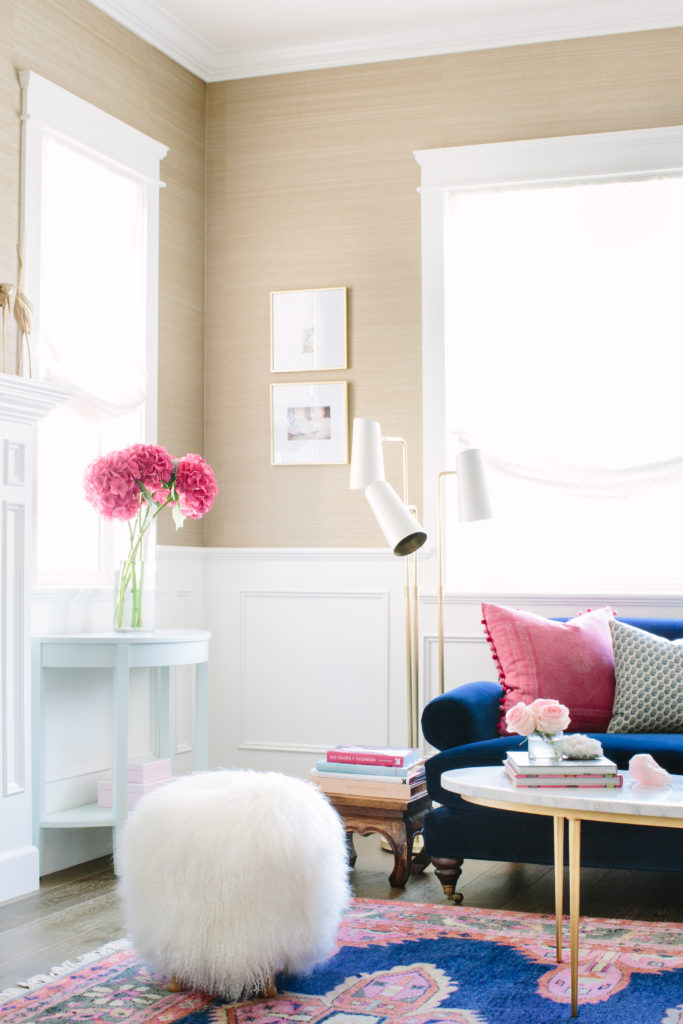 inspiration and tips how to decorate like a design pro use fresh flowers. navy and pink living room kismet rug